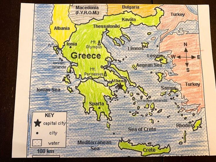 a drawing of the map of greece and its major cities is displayed on a piece of paper