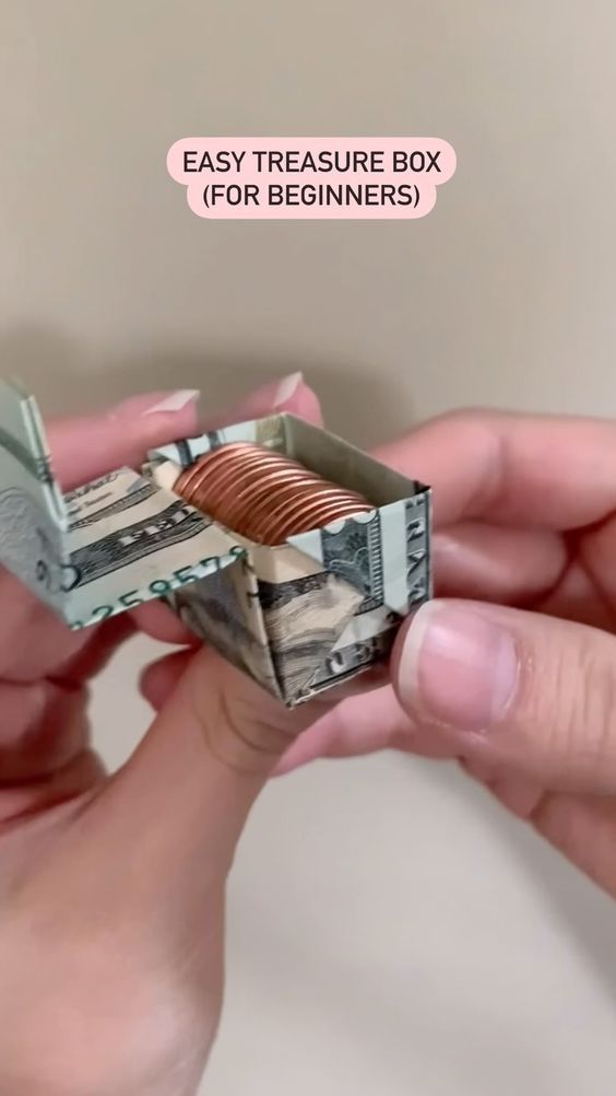 two hands holding money with the words easy treasure box for beginners