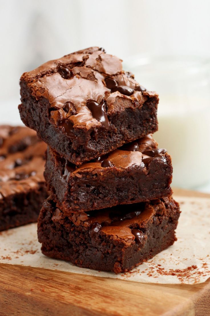 three chocolate brownies stacked on top of each other