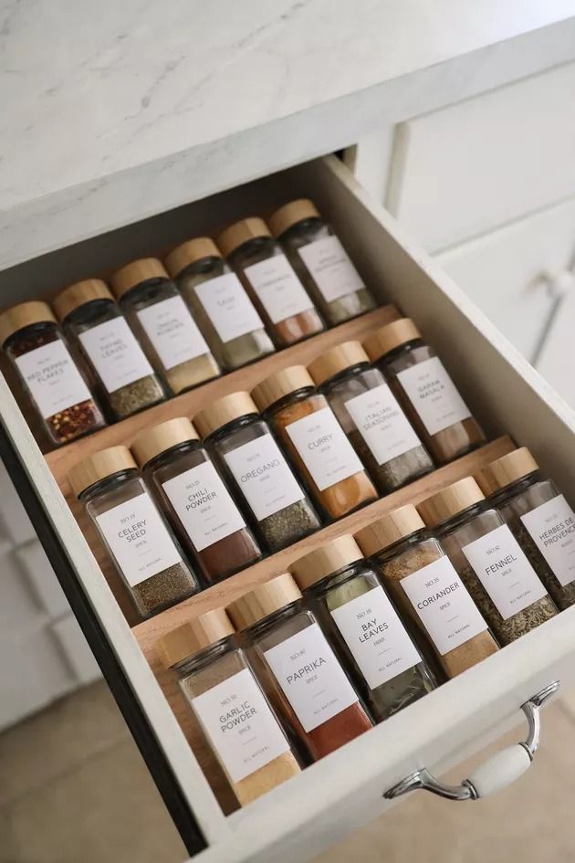 an open drawer filled with lots of spices