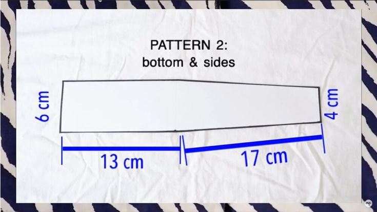 a zebra print sheet with blue lines on it and the measurements for each piece of fabric