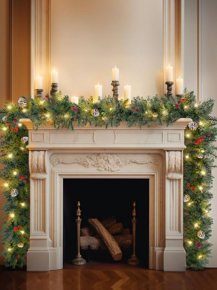 a fireplace decorated with christmas garland and lit candles