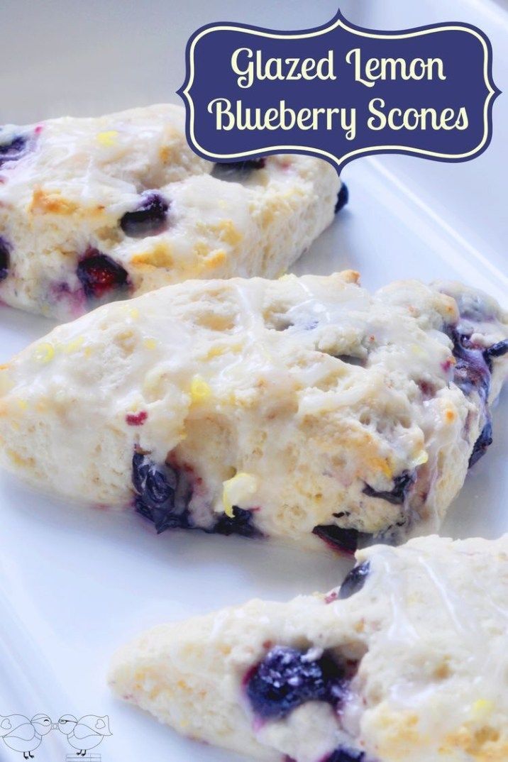 glazed lemon blueberry scones on a white plate