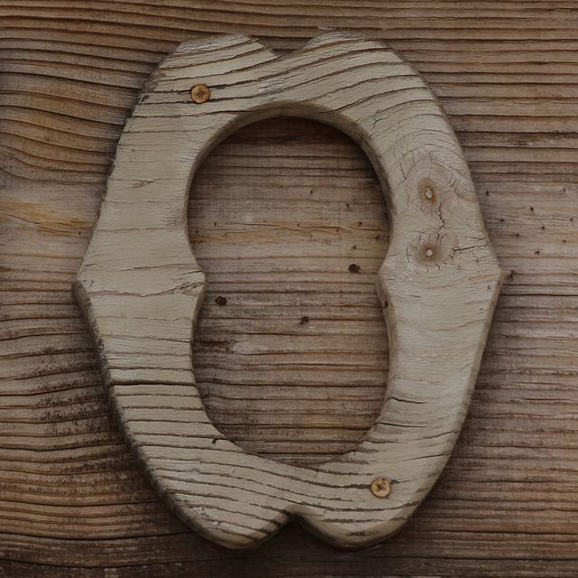 the letter q is made out of wood