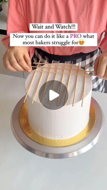 a person is cutting into a cake with toothpicks on it and the words wait and watch