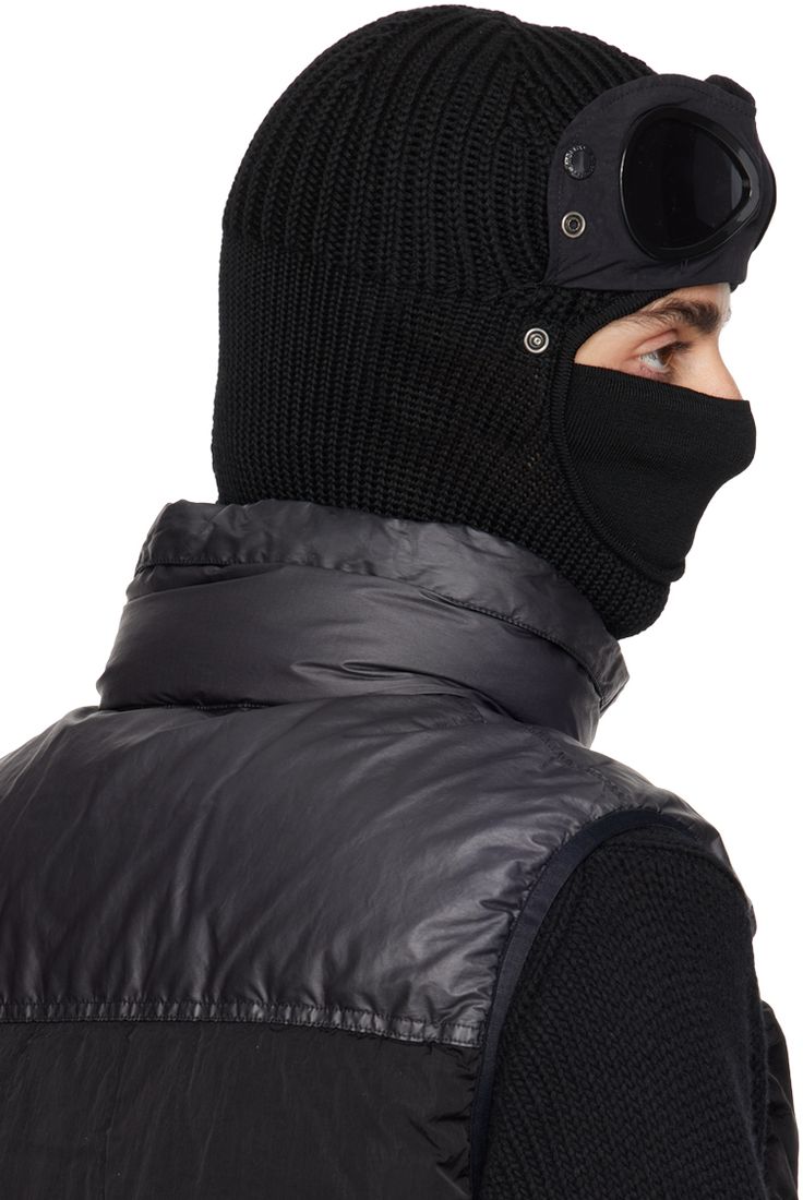 Knit extrafine merino wool and nylon taffeta balaclava in black. · Press-stud panel with acetate lenses at face · Logo flag and rolled edge at collar Face masks and face coverings are final sale and are not eligible for return or exchange. Supplier color: Black Black Balaclava For Cold Weather, Black Balaclava For Skiing In Winter, Black Skiing Balaclava For Winter, Black Full Face Balaclava For Cold Weather, Black Winter Skiing Balaclava, Black Windproof Full Face Balaclava, Face Logo, C P Company, Face Coverings