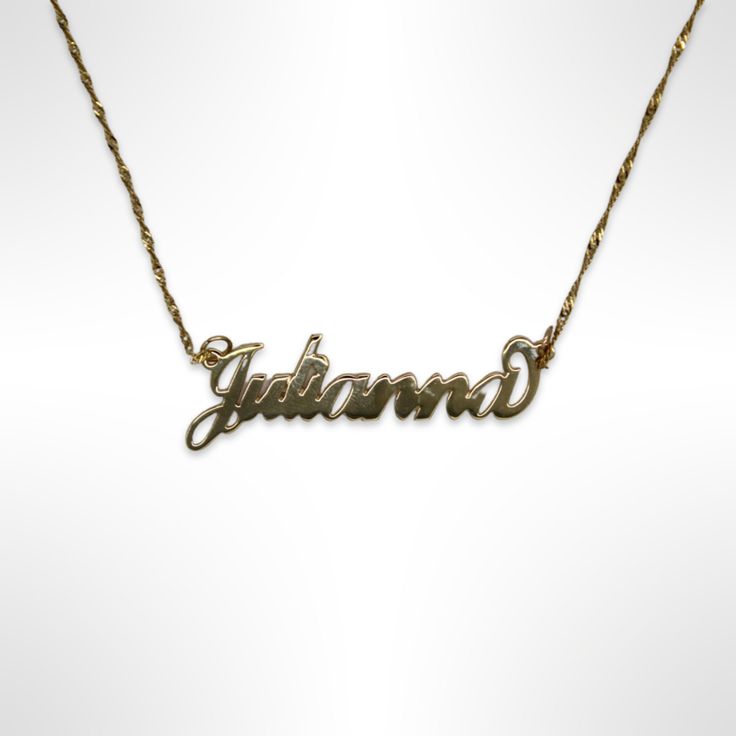 "⚓14K Gold \"Julianna\" Nameplate Necklace Solid 14K gold, stamped 14K. Not filled or plated. In excellent condition! We sell the highest quality vintage and pre-owned items. Free domestic shipping always! On its way to you in 1 business day.  30 day return policy!  ⚓The Details 19.5 inches long Nameplate: 1.5 inches wide 0.25 inches tall 0.35 mm thick Singapore chain: 1.15 mm thick Spring ring clasp 1.8 grams ⚓Who We Are  We are a small, family-owned business in Plymouth, MA. Located in the heart of Main Street, Main Street Jewelry Co.'s mission is to find one-of-a-kind, unique pieces. Vintage, antiques, and rare finds are our specialty, of course other than our brand new Italian silver chains with a price that can't be beat. We thank you for supporting small businesses everywhere and che Vintage Personalized Gold Plated Necklace, Personalized Vintage Gold-plated Necklace, Personalized Vintage Gold Plated Necklace, Classic Gold Hallmark Name Necklace, Classic Gold Name Necklace With Hallmark, Classic Gold Hallmarked Name Necklace, Personalized Vintage Gold-plated Jewelry, Personalized Vintage Gold Plated Jewelry, Gold Hallmark Nameplate Necklace