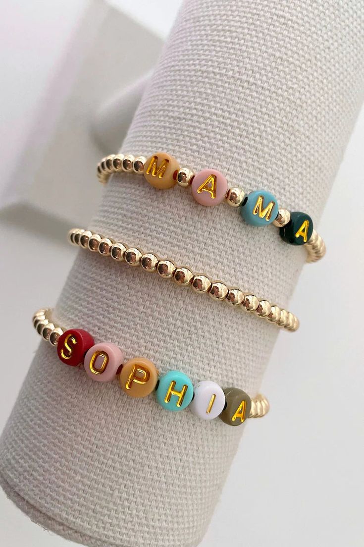 • one 14k gold name bracelet with colorful letter beads • all bracelets are made on a durable stretch elastic cord • please refer to our sizing guide before you purchase Letter Bracelet Beads Ideas Aesthetic, Name Bracelets Diy, Bead Letter Bracelet, Customizable Adjustable Stretch Bracelet, Adjustable Customizable Stretch Bracelet For Everyday, Personalized Multicolor Jewelry For Everyday, Adjustable Name Stretch Bracelet For Everyday, Beaded Bracelets Letters, Adjustable Multicolor Jewelry With Custom Text