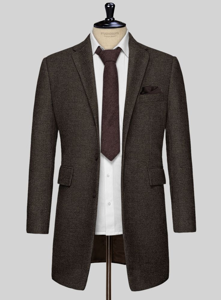 Incorporate refined, elegant style into your formal rotation with our Carre Brown Tweed Overcoat. Crafted from wool, its deep tone has the right amount of poise to make a strong statement wherever you go. A winter staple, the overcoat screams dapper with its meticulous attention to details that will make you look like a well dressed gentleman smack in the middle of winter. 
 
 The elusive overcoat will get all eyes on you and is sure to flatter your physique no matter what you wear it over or wh Tweed Overcoat, Brown Tweed, Well Dressed, All About Eyes, Elegant Style, Gentleman, Matter, Wool, How To Wear