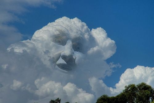 there is a large face in the clouds