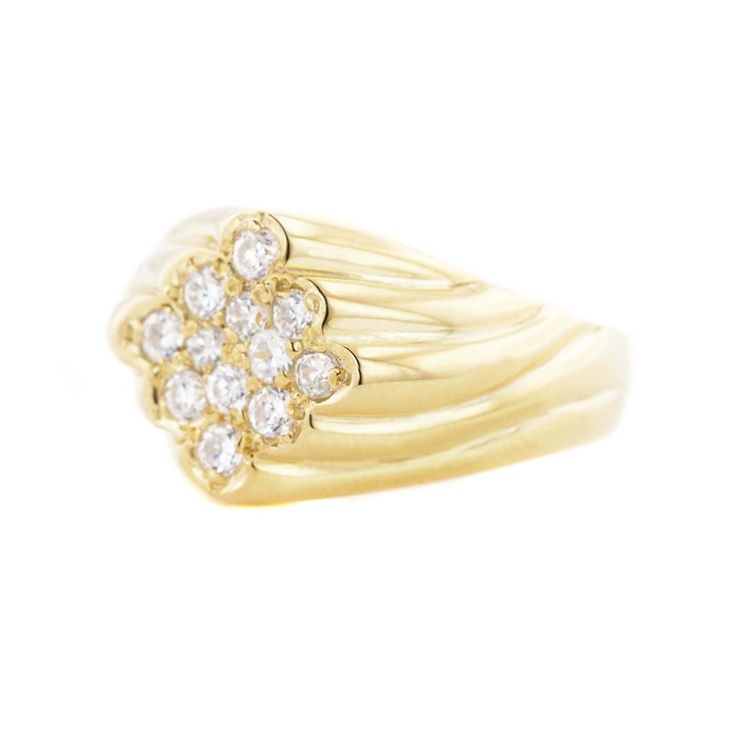 a yellow gold ring with white diamonds