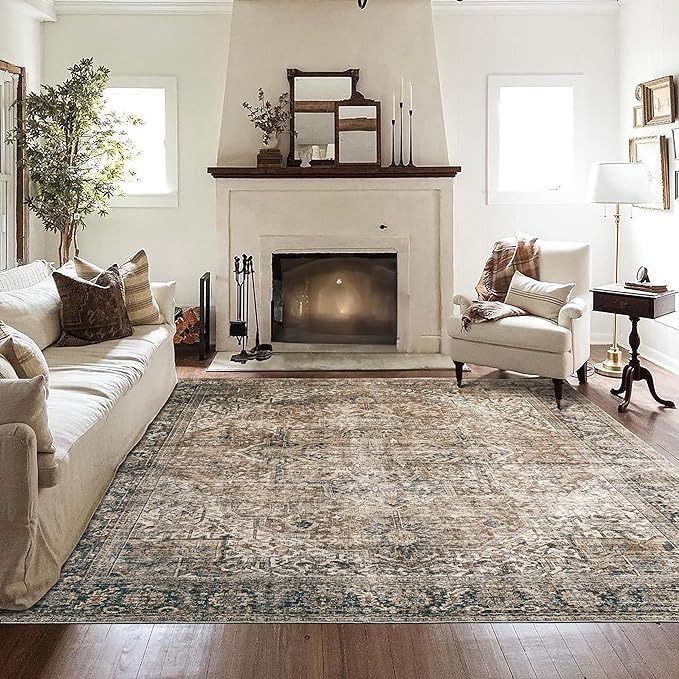 a living room filled with furniture and a fire place under a clock mounted on the wall