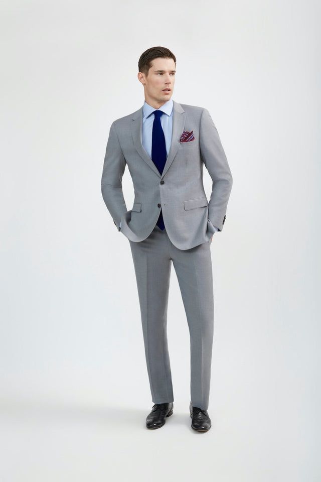 Fitted Suits With Pocket Square For Office, Fitted Office Suit With Pocket Square, Tailored Business Suits For Spring, Tailored Suits For Spring Business Events, Spring Suit With Notch Lapel For Business Meetings, Tailored Spring Business Suits, Spring Tailored Business Suits, Spring Business Suits, Single Breasted, Spring Business Suits Single Breasted