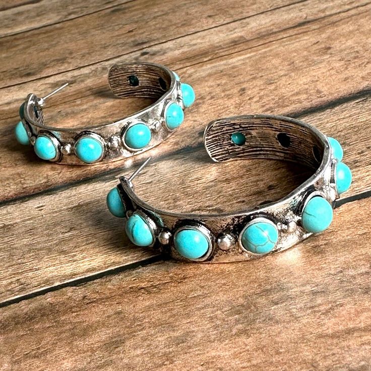 "Western Style Cowgirl Turquoise and Antique Silver Hoop Earrings Earrings measure 1 3/4\" x 3/8\". Matching bracelet sold separately." Turquoise Southwestern Hoop Earrings, Turquoise Metal Hoop Earrings, Turquoise Metal Hoop Jewelry, Turquoise Hoop Metal Jewelry, Southwestern Turquoise Nickel-free Hoop Earrings, Turquoise Southwestern Nickel-free Hoop Earrings, Southwestern Turquoise Hoop Earrings Nickel Free, Nickel-free Turquoise Metal Hoop Earrings, Turquoise Hoop Jewelry