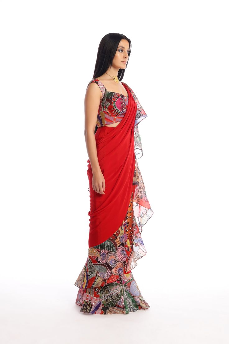 Kinfolk Candy red magnified printed embellished organza ruffle with mulberry crepe stitched saree & organza blouse. From Aisha Rao's Kinfolk collection. DELIVERY TIMEPlease allow 6-8 weeks for your outfit to arrive. FABRIC DETAILS Organza Ruffle with Mulberry Crepe Professional cleaning only. Festive Red Pre-draped Saree With Printed Motifs, Silk Saree With Ruffles, Festive Silk Chiffon Pre-draped Saree, Festive Ruffled Silk Saree, Bollywood Style Silk Blouse Piece With Ruffles, Festive Silk Blouse Piece With Ruffles, Festive Fusion Silk Pre-draped Saree, Bollywood Style Red Lehenga With Ruffles, Designer Red Pre-draped Saree With Ruffles