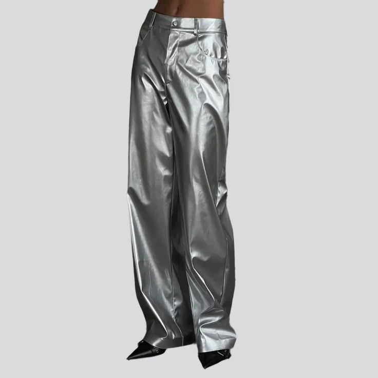 Introducing the 2023 Spring-Summer Collection's street-style silver elevated-rise jean pants—a trendy must-have for stylish trendsetters who love to make a bold statement! These wide leg denim pants feature a flattering high-waistline silhouette. with a zipper and button closure that lets you adjust the fit type for maximum comfort.Why You'll Love These PantsNail the street-style vibe and showcase your fashion-forward style with these silver tall-waist jeans that combine vintage charm and coutur Trendy Stretch Wide-leg Jeans, Shiny Solid Color Bottoms For Party, Solid Shiny Bottoms For Party, Fall Streetwear High-waisted Flare Jeans, Chic Baggy Flare Jeans, Shiny Solid Color Party Bottoms, High-waisted Flare Jeans For Fall Streetwear, Summer High Rise Baggy Wide Leg Pants, Solid Shiny Party Bottoms