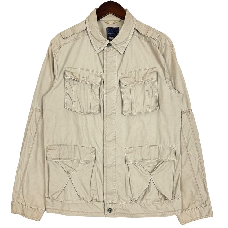 MFG Marithe Francois Girbaud Utility Mens Jacket Beige Color Size Large * Size on Tag : L * Manual Measurement (inch) : Chest 22, Length 29.5, Shoulder 19, Sleeve 25.5, Hem 20. * Recommended for Size : Large (L) & (M) Medium * Color : Beige * Condition : Used Condition. * See photos for details. * Free Defect : No Stain, No Holes, No Tears, No Faded. BX321 Beige Long Sleeve Outerwear With Cargo Pockets, Beige Winter Outerwear With Cargo Pockets, Beige Long Sleeve Outerwear With Multiple Pockets, Beige Military Style Long Sleeve Outerwear, Utility Beige Outerwear With Side Pockets, Beige Utility Outerwear With Side Pockets, Beige Cotton Outerwear With Cargo Pockets, Casual Beige Utility Jacket With Cargo Pockets, Beige Outdoor Outerwear With Flap Pockets