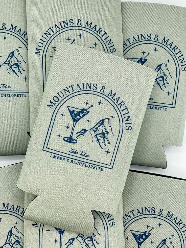 six napkins with blue ink on them sitting next to each other in front of a white background