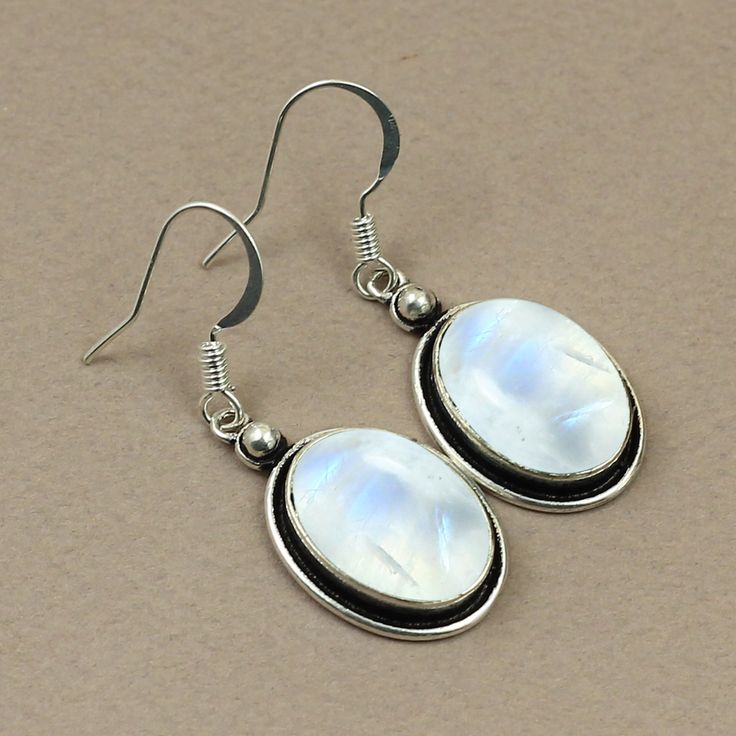 Natural Rainbow Moonstone Gemstone 925 Sterling Silver Earring Jewelry. Earring made by Natural Rainbow Moonstone Gemstone with pure 925 sterling silver. The unique design jewelry Earring has been fashioned out of 925 sterling silver and promises to be comfortable wear at all times. This Jewelry can be a perfect gift for your loved ones and one of a kind design makes this thing perfect for engagement gift, wedding gift, marriage anniversary gift and birthday gift. Rainbow Moonstone Earring, Oval Silver Oval Sterling Silver Crystal Earrings, Sterling Silver Oval Crystal Earrings For Gift, Oval Sterling Silver Crystal Earrings For Gift, Oval Sterling Silver Crystal Earrings, White Oval Moonstone Earrings, White Sterling Silver Earrings Stamped 925, Handmade White Oval Earrings, Silver Moonstone Earrings With Ear Wire, Silver Moonstone Gemstone Earrings