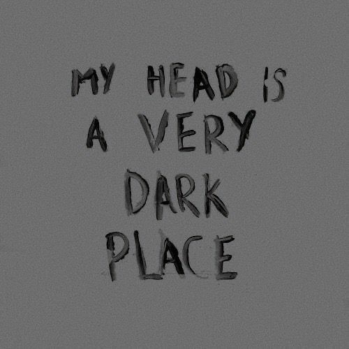 a black and white photo with the words my head is a very dark place written on it