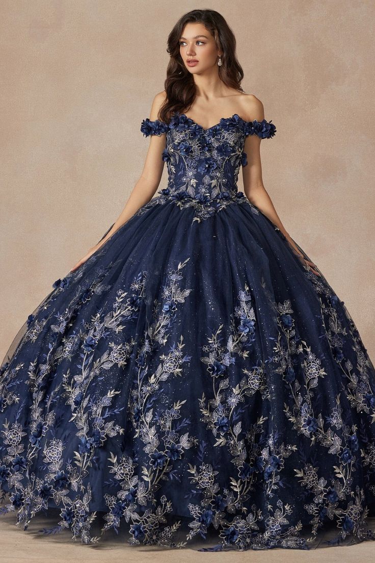 Look timeless in this 3D floral applique long off the shoulder embroidered dress with A-line skirt by Juliet 1447. This beautiful off the shoulder ballgown features a sweetheart bodice, a open lace-up back, and a floor length A-line skirt that ends in a sweep train. 3D Floral Applique Off Shoulder Ball Gown by Juliet 1447 Off the shoulder sweetheart bodice with cap sleeves Open lace-up back with a zipper closure Floor length A-line skirt with a sweep train Fabric: Glitter Tulle, Beaded 3D Floral Beautiful Ballgown, Train Fabric, Off Shoulder Ball Gown, Military Ball Dresses, Fabric Glitter, Quinceanera Dress, Illusion Dress, Sweetheart Dress, Pageant Dresses