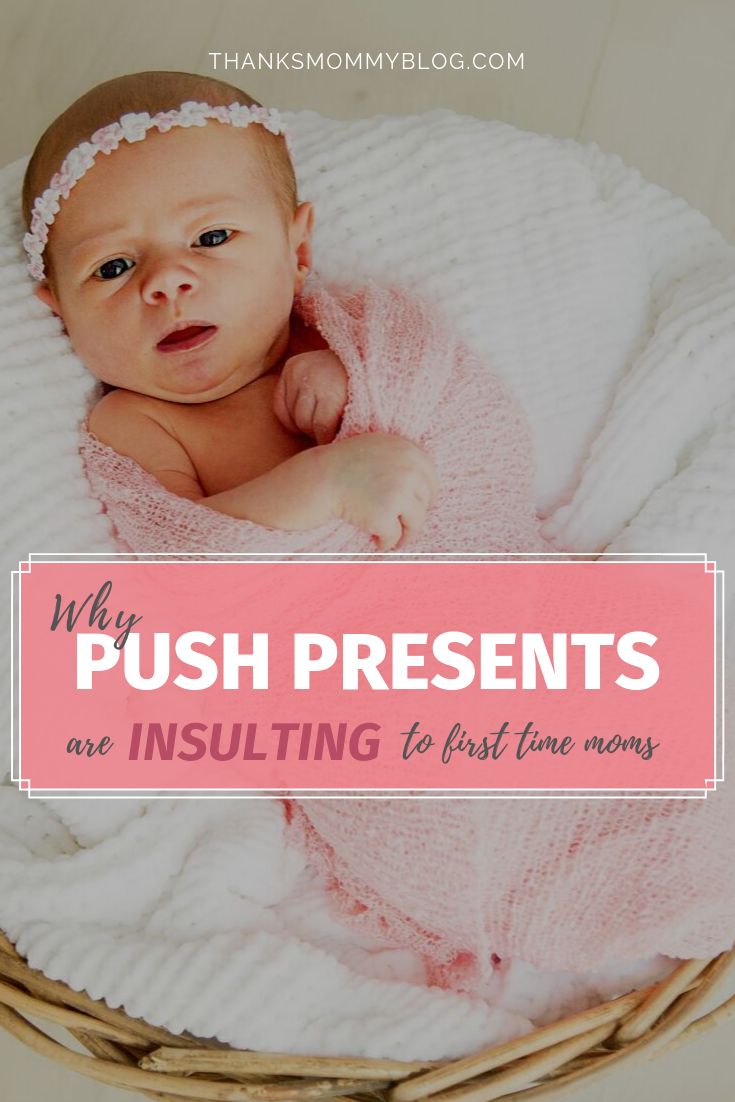 a baby in a basket with the words, why push presents are insulating at first time moms