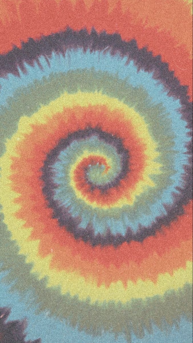 an image of a spiral design in red, yellow, and blue colors on a tie - dye background