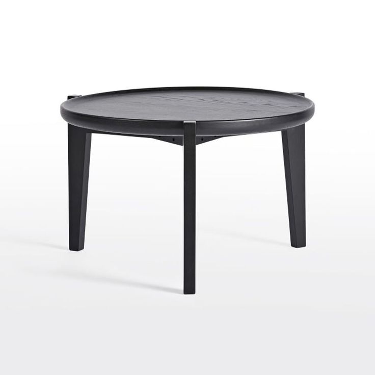 a round table with black legs and a wooden top on an isolated white surface, viewed from the side