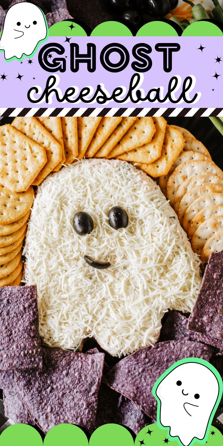 a plate with crackers and cheese in the shape of a ghost on it's face