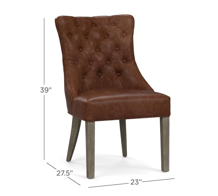 the side view of a brown leather dining chair with wood legs and backrests