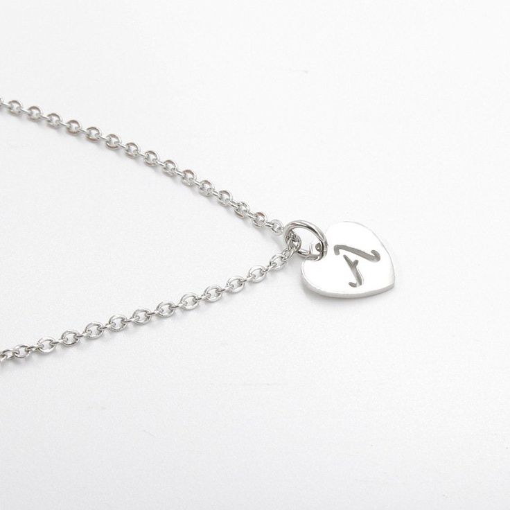 "2pcs 45cm Polished Stainless steel Heart Alphabet pendant Personalized Stamping Necklace, steel Heart Necklace,A-Z Alphabet Charm Chain ✿ QTY: 2pcs ✿ Pendant Size: 1.2x12mm ✿ Chain Length:18\"(45cm) ✿ Material: 316 Stainless Steel ✿Color: Sliver ✿ Nickel Free & Lead Free Top Quality Triangle Necklaces, Mirror Finish, Smooth edges, Highly Polished Stainless Steel horizontal Triangle . These are top qualityTriangle With chains. These come in Silver, Gold or Rose Gold. Stainless steel is the g Heart-shaped Stainless Steel Jewelry, Stainless Steel Heart Charm Pendant Necklace, Stainless Steel Heart Pendant Necklace For Mother's Day, Mother's Day Heart Pendant Necklace In Stainless Steel, Silver Metal Heart Necklace For Mother's Day, Mother's Day Stainless Steel Heart Pendant Necklace, Silver Necklace With Initial Pendant And Heart Charm, Stainless Steel Heart Pendant Necklace With Charm, Valentine's Day Silver Charm Necklace With Adjustable Chain