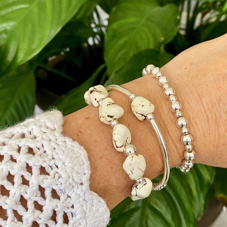 WHITE & SILVER BRACELET * Thanks for choosing us ! We really want to make you happy! You can Choose : *All White Nuggets Howlite (8 to 10mm) & Sterling silver beads (4mm)... WHITE & SILVER * 1 piece of White Nuggets Howlite (8 to 10mm) between 2 sterling silver curved Tubes (40x30 )& Sterling silver beads (4mm)... WHITE &TUBES * MIX (Only Sterling silver -6&4mm) MIX 6&4 SET 2: (2 Bracelets) WHITE & SILVER WHITE &TUBES SET 3 : (3 Bracelets) WHITE & SILVER W Tube Bracelet, White Bracelet, White Bracelets, White Howlite, Bracelet Women, Stretchy Bracelets, Layered Bracelets, Pretty Gift, Sterling Silver Bracelet