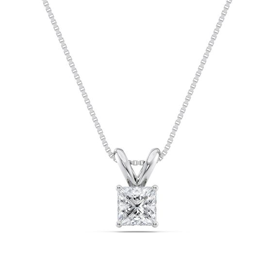 Bestowing sweet elegance, princess-cut diamonds are truly enchanting. A treasure for her neck, surprise the woman you love with a sparkling solitaire pendant. This 1/2 ct. certified princess-cut diamond solitaire pendant in platinum glistens with a color ranking of I and a clarity ranking of Vs2. A stunning accessory for her enjoyment, this luminous diamond suspends from an 18.0-inch box chain with a lobster claw clasp. This certified diamond pendant comes with a certificate that includes a phot Princess Pendant, Diamond Solitaire Pendant, Solitaire Pendant, Princess Cut Diamonds, Box Chain, Diamond Solitaire, Princess Cut, Diamond Pendant, Lobster Claw