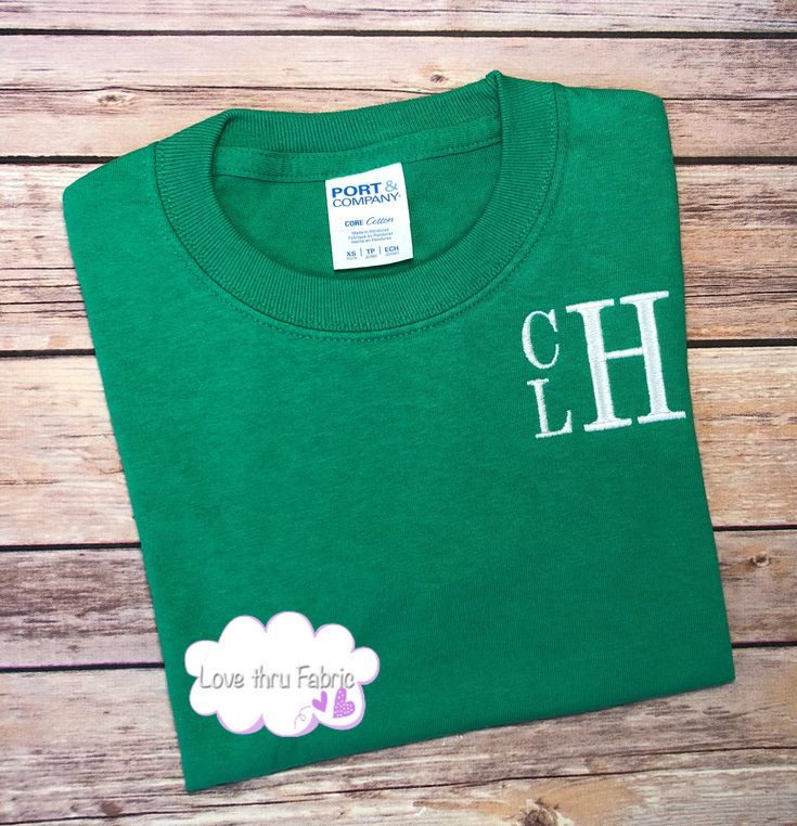 "These monogrammed t-shirts are made of a comfortable cotton fabric, making a casual, yet stylish, addition to the wardrobe of any boy. I offer boys t-shirts using four different styles of fonts. Shirts ordered from this listing will be monogrammed using a stacked font as shown in the listing picture. The order of the letters will be FIRST NAME as the top, small letter, MIDDLE NAME as the bottom small letter, and LAST NAME as the large letter. IMPORTANT: When placing your order please provide th Cute Cotton T-shirt With Name Print, Customizable Basic Cotton Shirt, Customizable Long Sleeve Green T-shirt, Customizable Green Long Sleeve T-shirt, Family Matching Cotton T-shirt With Name Print, Green Cotton Shirt With Name Print, Cute Green Tops With Name Print, Personalized Short Sleeve Cotton Shirt, Personalized Cotton Short Sleeve Tops