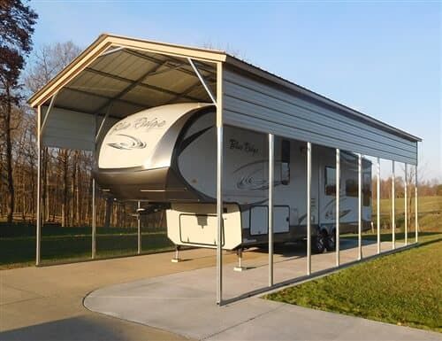 an rv is parked under a metal awning