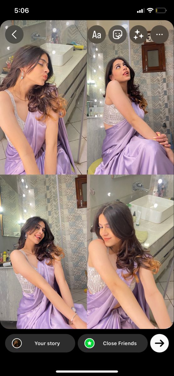 a woman in a purple dress taking a selfie