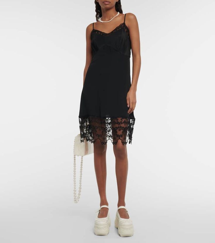 Find SIMONE ROCHA Lace-trimmed Slip Dress on Editorialist. Material: 73% acetate, 27% silk. Care instructions: dry clean. Made in Portugal. Designer color name: Black. Trim: 100% polyamide. Adjustable shoulder straps. Embroidery: 100% polyester. Chic Sleeveless Slip Dress With Satin Trim, Chic Formal Slip Dress With Lace Trim, Silk Midi Dress With Lace Trim For Party, Summer Silk Slip Dress With Lace Trim, Chic Evening Slip Dress With Lace Trim, Summer Formal Slip Dress With Lace Trim, Spring Formal Slip Dress With Lace Trim, Chic Fitted Slip Dress With Satin Trim, Chic Lace Trim Slip Dress