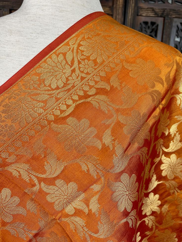 Beautiful Orange double tone dupatta with a tint of orange. Item: Dupatta Base color : Orange Fabric : Soft Silk (Not Pure Silk) Work : Zari Weaved with tassels Size : 2.5 meters Length of the Dupatta : 92 inches approx. Width of the dupatta : 35 1/2 inches (Approx.) Orange Blouse Piece For Puja During Navratri, Orange Anarkali With Sheer Dupatta, Orange Handloom Blouse Piece For Navratri, Orange Anarkali Dupatta For Eid, Orange Anarkali Traditional Wear With Dupatta, Orange Salwar Kameez For Diwali With Traditional Drape, Orange Salwar Kameez For Diwali, Orange Handloom Art Silk Traditional Wear, Orange Art Silk Handloom Traditional Wear