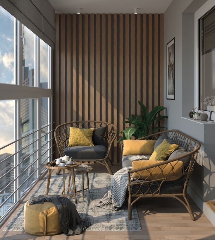 a living room filled with furniture next to a large glass window on top of a hard wood floor