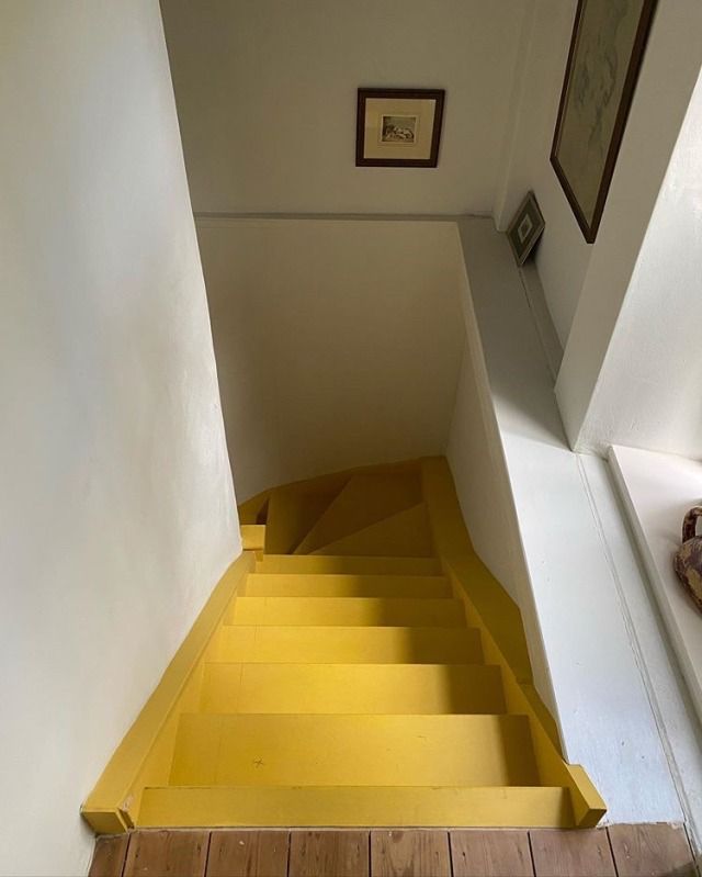 there is a yellow stair case in the house