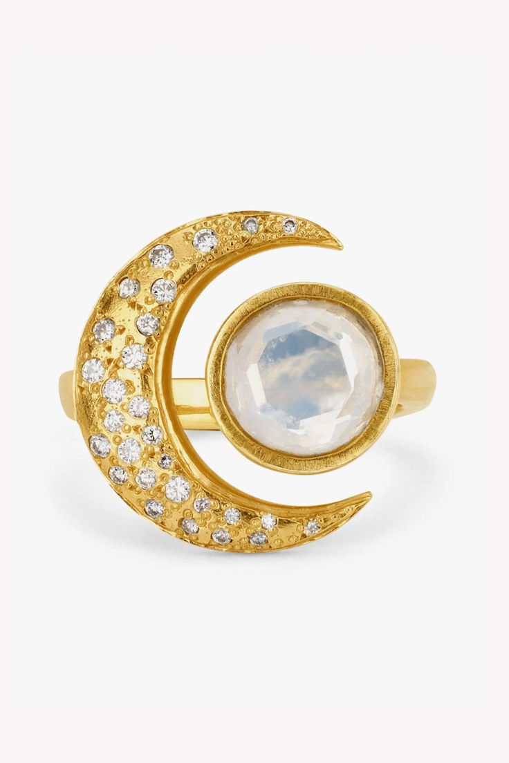 Logan Hollowell 14k yellow gold round faceted moonstone ring, complimented by a star set diamond encrusted crescent, .23ct total weight. Feel like a queen of the universe with this one of a kind statement ring. Moonstone Gemstone meaning: Brings good fortuneAssists in foretelling the futureEnhances intuitionPromotes inspirationBrings success in love as well as business mattersOffers protection on land and at seaThe moonstone is associated with the moon and was the stone of the goddess Diana. The Celestial Crescent Moonstone Ring For Anniversary, Celestial Moonstone Jewelry With Rose Cut Diamonds, Celestial Moonstone Ring With Moon Phase For Anniversary, Celestial Moonstone Ring With Rose Cut Diamonds, Celestial Moonstone Rings With Rose Cut Diamonds, Celestial Gemstone Rings, Unique Gold Moonstone Ring With Rose Cut Diamonds, Celestial Diamond Moonstone Ring, Celestial Style Rings With Diamond Accents