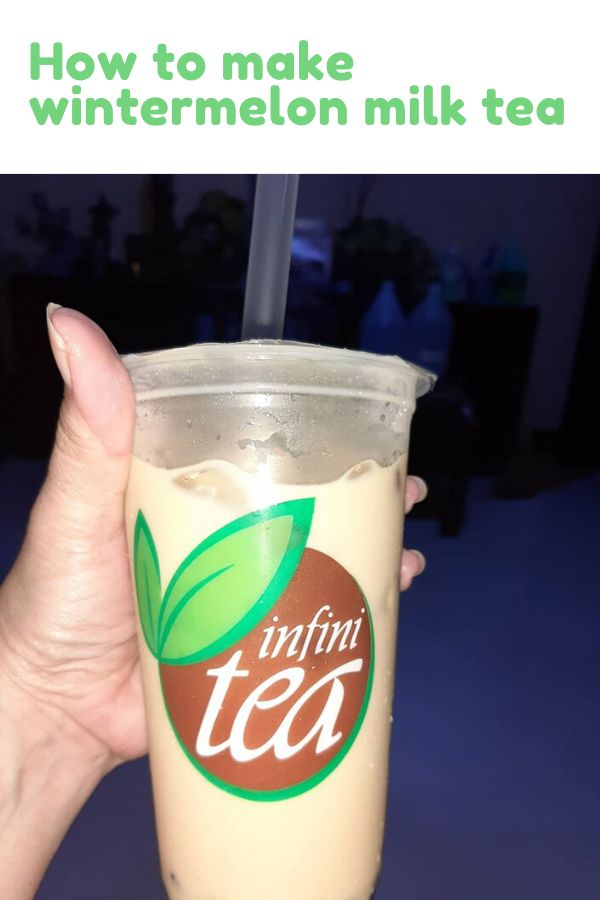 a person holding up a drink in front of the camera text reads how to make wintermelon milk tea