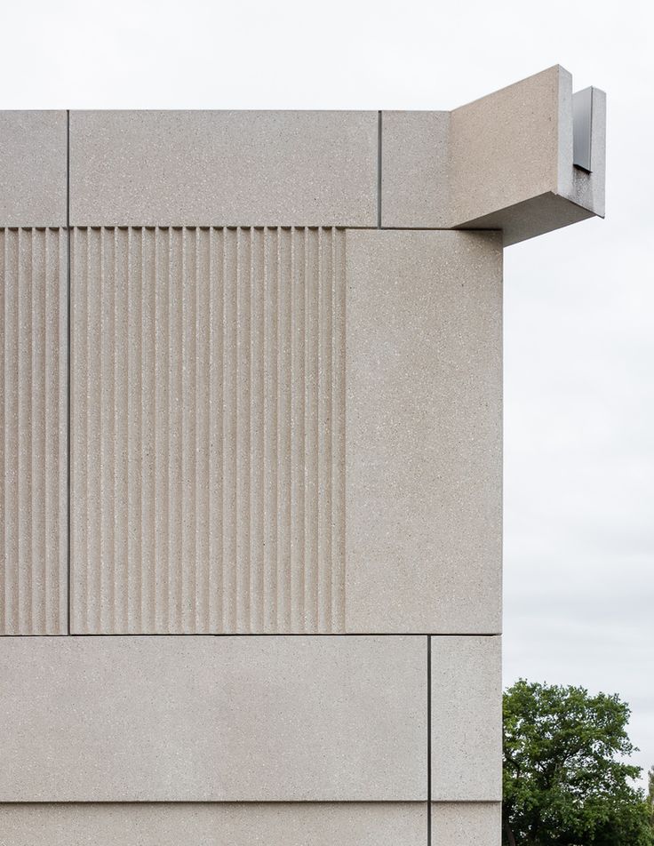 the side of a building with a clock on it