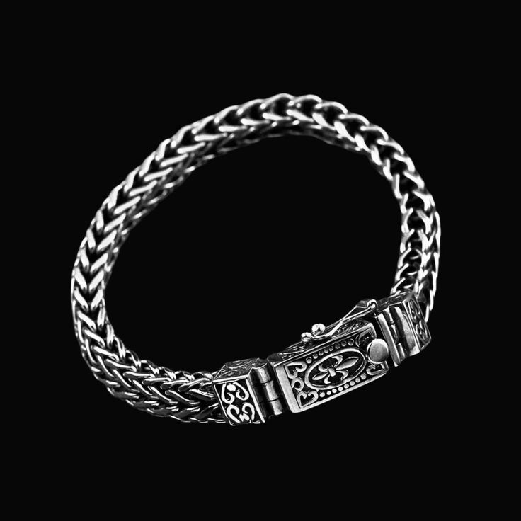 From the timeless art of handcrafting, where tradition meets modern elegance, comes a bracelet that embodies both strength and sophistication. Our Handwoven Rope Twist Bracelet features an intricate rope twist pattern, symbolizing unity and resilience. Crafted from high-quality materials, this bracelet combines durability with a refined aesthetic. Perfect for those who appreciate unique and stylish accessories, this bracelet adds a touch of classic charm to any outfit. Made from high-quality mat Classic Adjustable Bracelet With Intricate Design, Classic Adjustable Sterling Silver Bracelet With Intricate Design, Traditional Adjustable Chain Bracelet With Sterling Silver Clasp, Elegant Engraved Braided Bangle Bracelet, Classic Chain Bracelet With Intricate Design As Gift, Elegant Braided Sterling Silver Bracelet Gift, Elegant Adjustable Sterling Silver Bracelet With Stainless Steel Clasp, Elegant Sterling Silver Bracelet With Adjustable Stainless Steel Clasp, Elegant Braided Bracelets As Gift