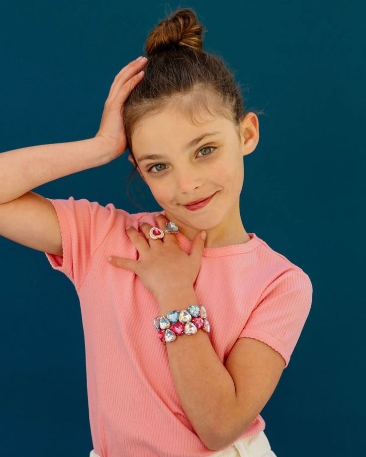 Heart Skip a Beat? These Sparkles Will Do That! Wear your heart on your sleeve… or rather, your wrist and fingers! This set is all about showing off your big love with big, heart-shaped gems. The set comes with two bracelets and two rings—one set is pink and the other is blue. Perfect for sharing with a super friend or stacking them all for a doubly delicious look. We think you’ve got a heart of sparkles! All items come in our yellow gift box or signature packaging. Our rings are all size 4 and Sparkly Gifts, Jewelry Kids, Heart Jewelry Set, Heart On Your Sleeve, Hair Tie Bracelet, Yellow Gifts, Two Rings, Heart To Heart, Kids Bracelets