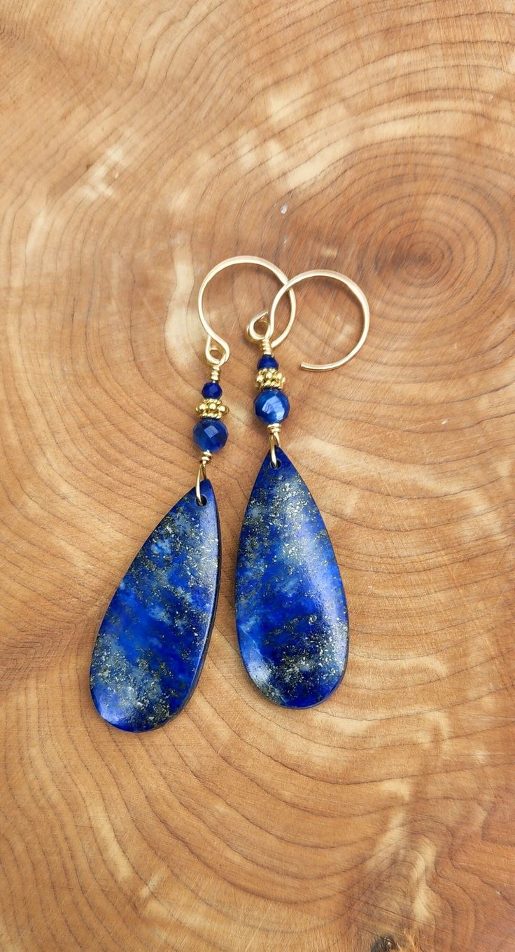 Magical gold stardust lapis lazuli teardrop earring with gold vermeil beads and crescent gold-filled ear wire. Celestial, magical, gift for her. Nickel-free Teardrop Spiritual Jewelry, Spiritual Teardrop Nickel-free Jewelry, Bohemian Blue 14k Gold-filled Jewelry, Blue Bohemian 14k Gold Filled Jewelry, Bohemian Blue 14k Gold Filled Jewelry, Celestial Teardrop Earrings Gift, Celestial Teardrop Earrings For Gift, Bohemian Yellow Gold Wire-wrapped Earrings, Bohemian Yellow Gold Wire Wrapped Earrings