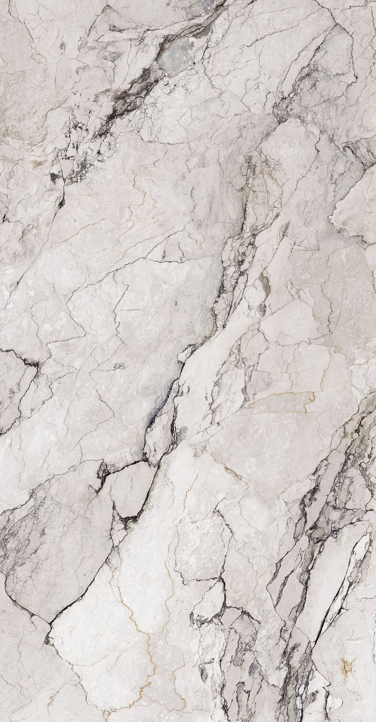 white marble textured with black vein lines