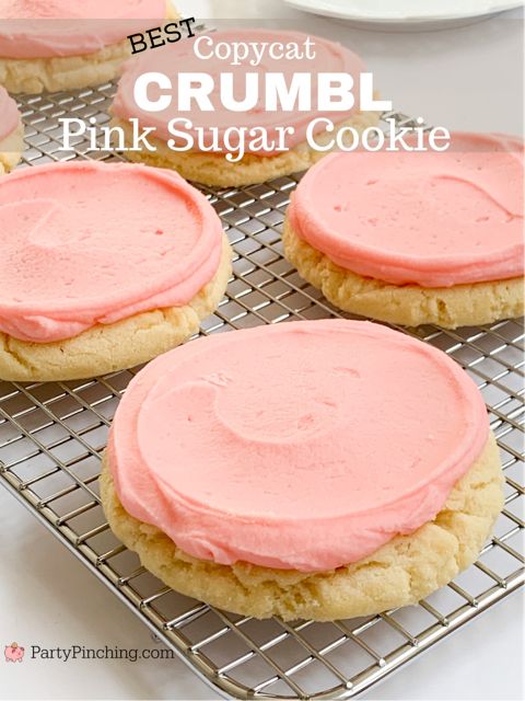 pink sugar cookies on a cooling rack with the words best copycat crumbl