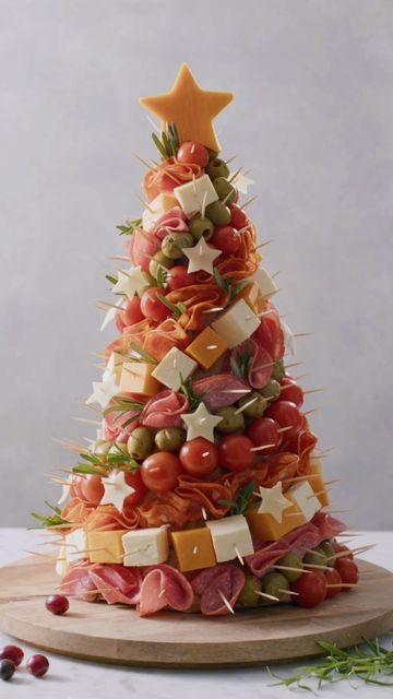 a christmas tree made out of cheese and meats