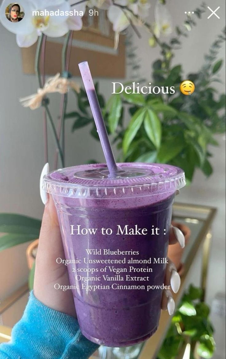 a person holding up a purple smoothie in front of a plant with the words how to make it?